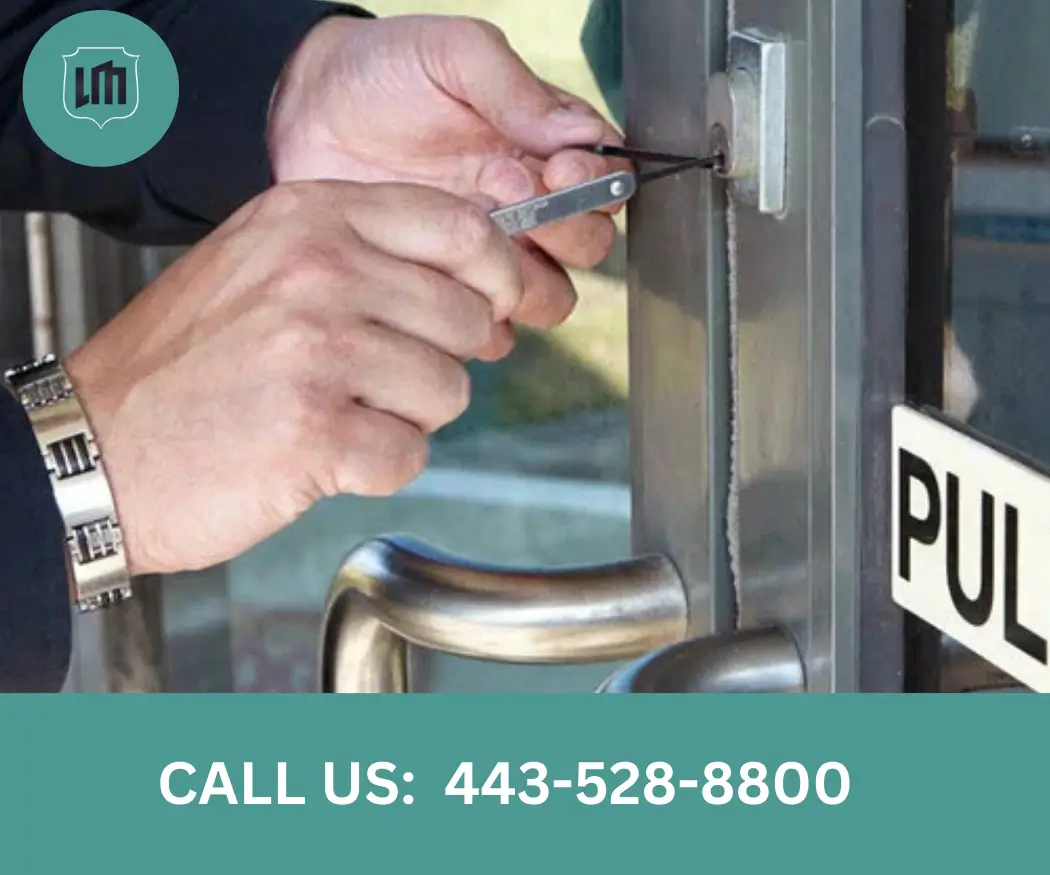 Mobile locksmith servicing a business door lock in Towson