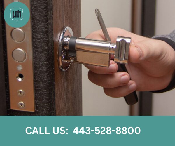 Residential locksmith in Baltimore City rekeying door locks