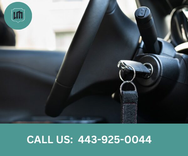 Emergency locksmith in Catonsville helping unlock a car door